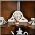 P02. Porcelain mantel clock. 